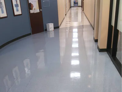 Floor finishing before and after showing dramatic improvement in appearance and protection