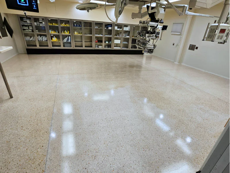 Professional terrazzo floor coating service showing natural stone protection